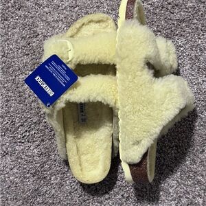 Birkenstock Shearling Sandals in Soft Yellow